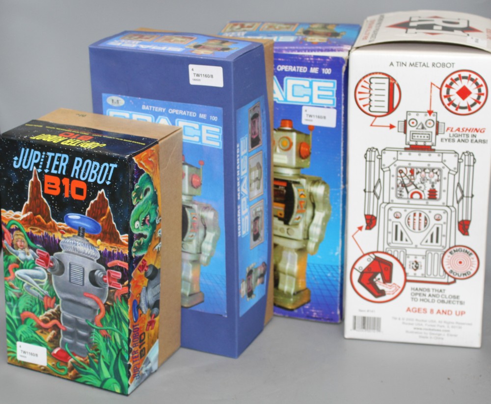 Four collectors robots, various, including a Rocket Toys R-1, two battery-operated ME 100 Space Walk Man (one black, one blue) and a